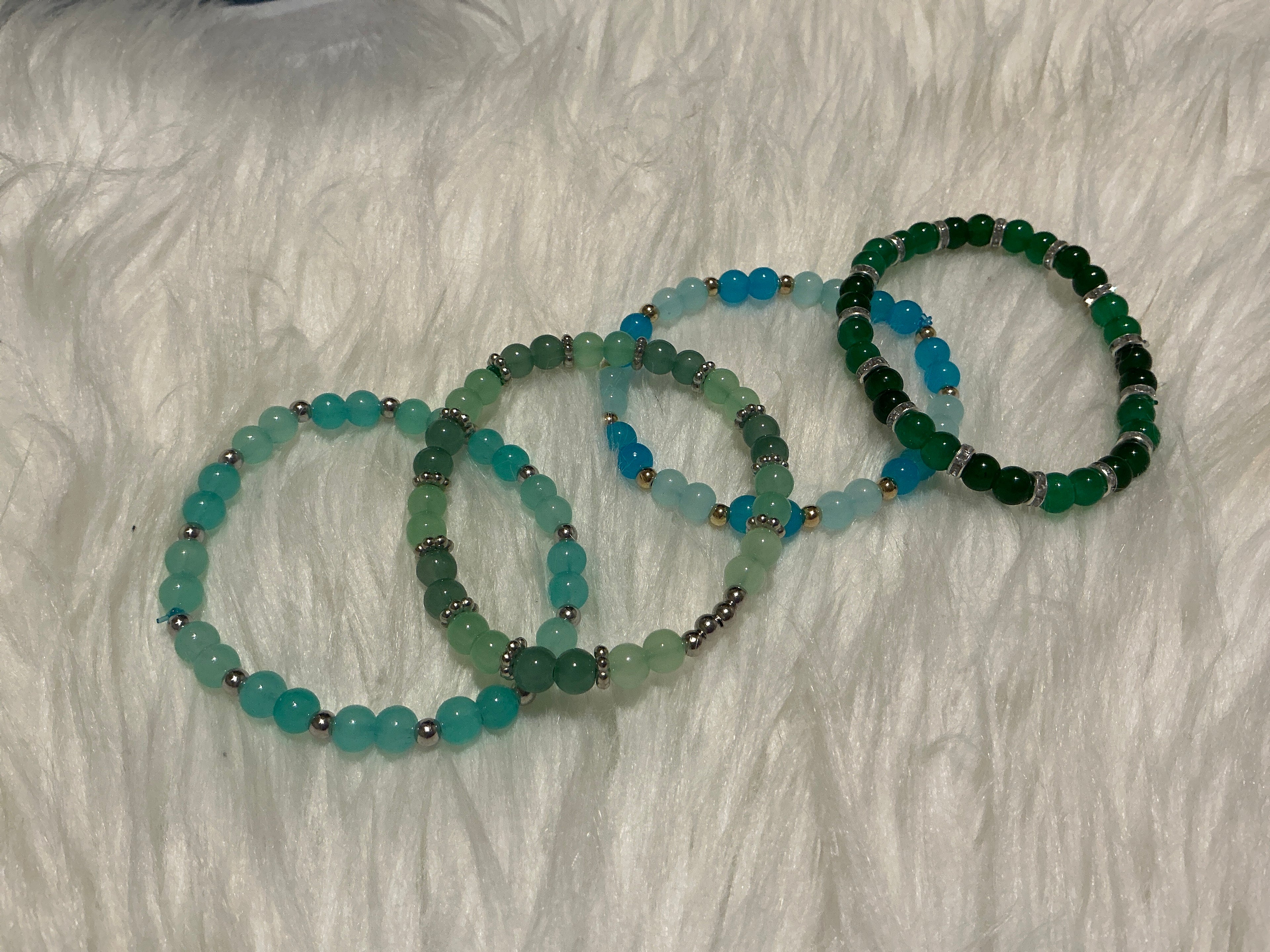 Green and blue beaded bracelets